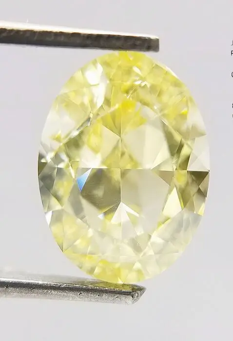 1 pcs Diamant - 2.00 ct - Ovaal - fancy light yellow - VS1
