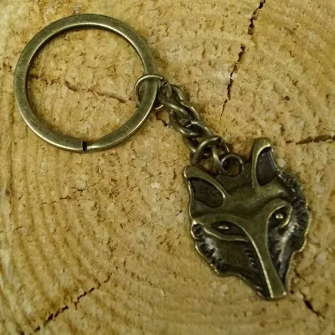 Sleutelhanger " Wolven kop " Brons kleurig