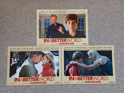 IN   A   BETTER   WORLD     lobbycard set.