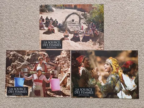 THE SOURCE lobbycard set.