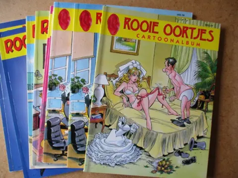 Rooie oortjes cartoonalbum adv7896