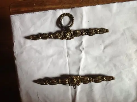 Koperen ornament voor schellenkoord