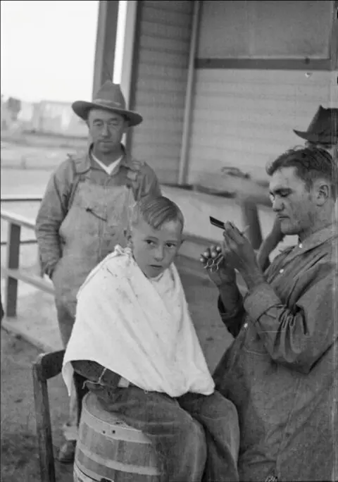 Dorothea Lange (1895-1965) - Community barber shop in Kern