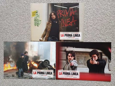 LA   PRIMA   LINEA     lobbycard set.