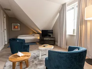 Ruime suite op de eerste etage met eigen badkamer