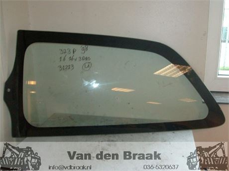 Mazda 323P 3 deurs 1997-2001 Zijraam achter links