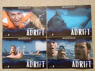 ADRIFT     lobbycard set.