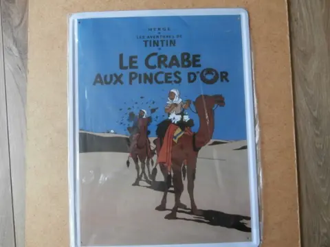 Metalen kuifje poster adv7411