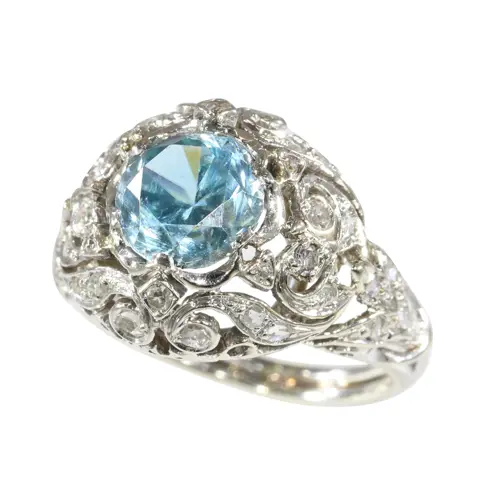 Vintage Platinum Ring with Blue Zircon  Mid-Century Elegance in Openwork Design