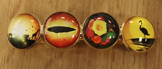 Haarclip cabochon " Dieren bij zonsondergang "