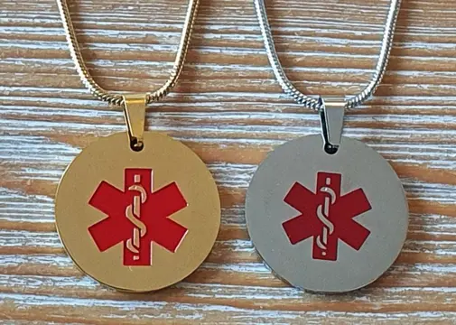 Ronde medische hanger zilverkl. of goudkl. met medisch teken