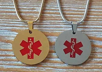 Ronde medische hanger zilverkl. of goudkl. met medisch teken