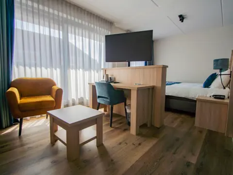 Junior suite met balkon niet ver van het strand