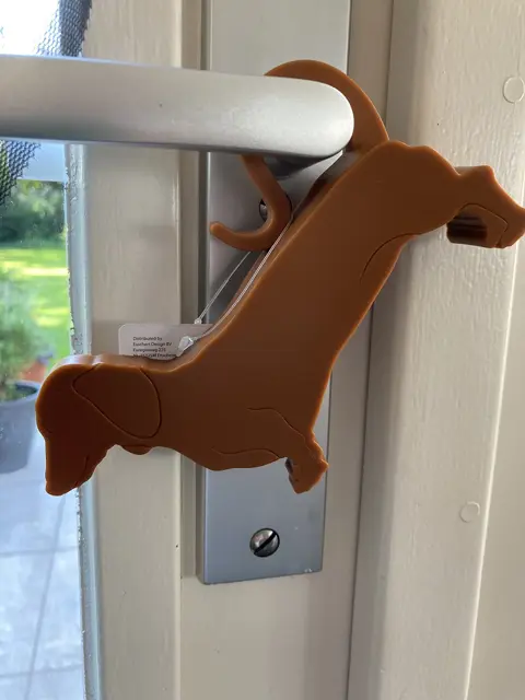 DEURWIG TECKEL DEURSTOPPER NIEUW