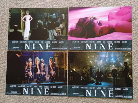 NINE lobbycard set.
