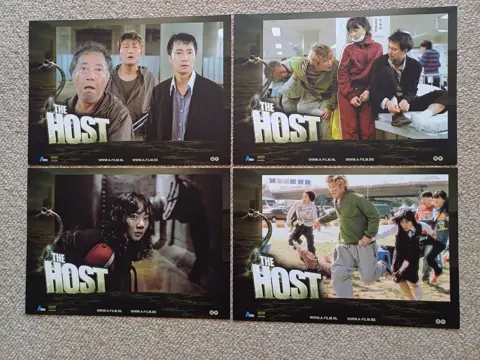 THE HOST lobbycard set.
