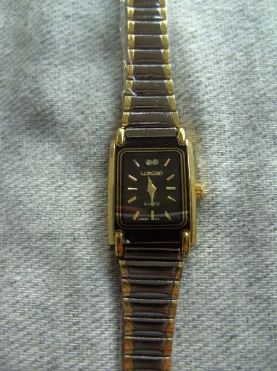 HORLOGE STAAL DAMES ANALOOG VIERKANTE KAST NIEUW.