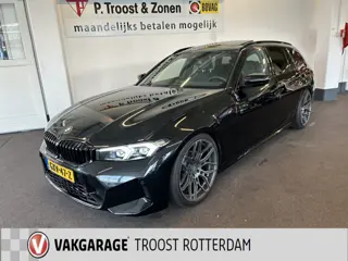 BMW 3 Serie Touring 318i M Sport | Panoramadak | Fabrieksgarantie | 20''INCH | Verlaagd | Lederen be