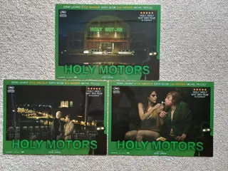 HOLY MOTORS lobbycard set.