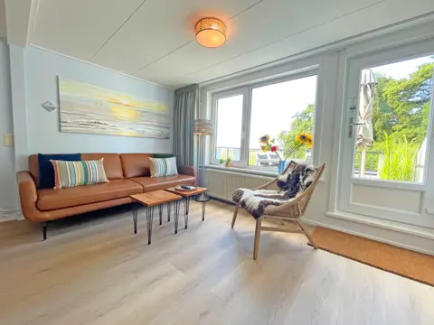 Fijn appartement in complex op steenworp van het strand