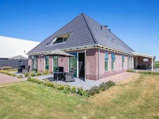 Landelijk gelegen luxe appartement vlakbij het strand en dorp