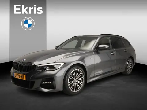 BMW 3 Serie Touring 318i | M-Sportpakket | Laserlicht | Leder | Navigatie | Sportstoelen | Stoelverw