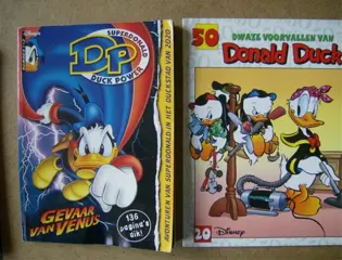 Superdonald en 50 reeks adv. 709