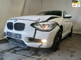 BMW 1-serie 116i Business+ - Airco - Navi - Front Schade