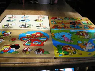 Puzzels hout met en zonder knopjes