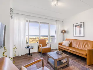 Appartement nabij De Koog met balkon en uitzicht over zee