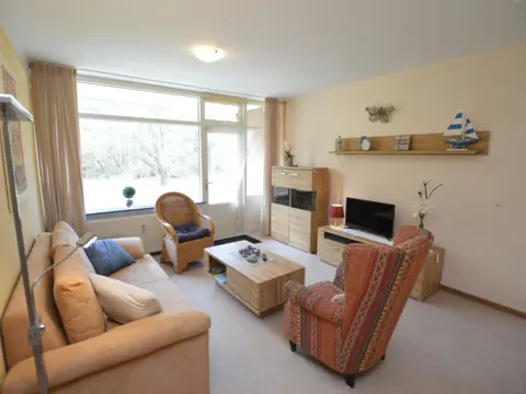 Aan tuinzijde gelegen appartement met terras dichtbij de Koog