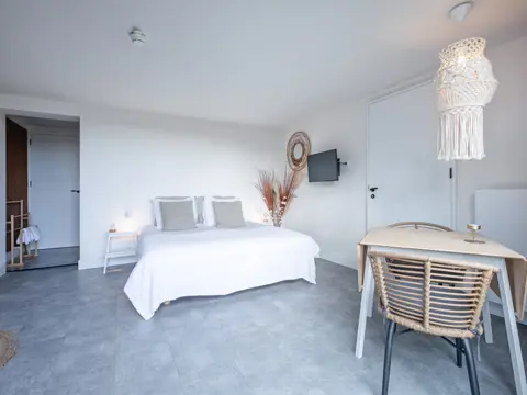 Tuin suite Deluxe in authentieke stolpboerderij bij de Waddenzee