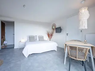 Tuin suite Deluxe in authentieke stolpboerderij bij de Waddenzee