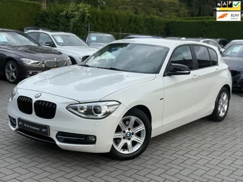 BMW 1-serie 116i High Executive Sport|Nieuwe Ketting + Klepseals|Leder|Navigatie|Cruise control|Clim