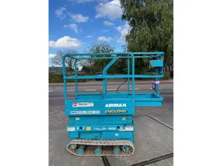 Gebruikte schaarhoogwerker op rups Airman ENCL045