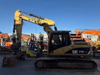 Caterpillar 319D (bj 2008)