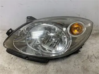 Renault Twingo II (CN) Hatchback 3-drs 1.2 koplamp LINKSVOOR 2007-2014