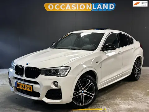 BMW X4 XDrive20i High Executive M-SPORT|SCHUIF/KANTELDAK|KEYLESS|STOELV|360CAM|LEDER|DODEHOEK|BLUETO