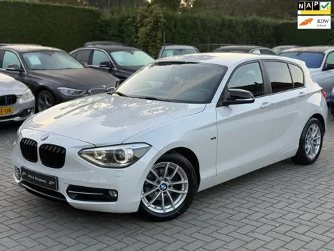 BMW 1-serie 114i EDE Business Sport|Nieuwe Ketting + Klepseals|Parelmoer Wit|Navigatie|Xenon|Cruise 