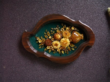 Exclusieve amber kunstwerk in sierlijke bloemmotieven!