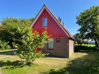 Vrijstaand vakantiehuis aan de Waddenzee en natuurgebied Utopia