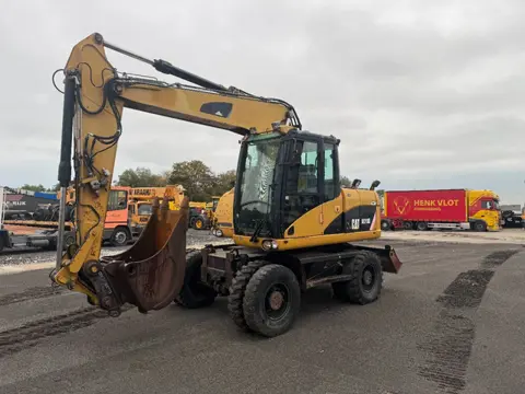 Caterpillar M313D 7212 HOURS (bj 2008)
