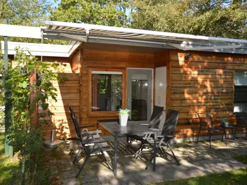 Ideaal gelegen vakantiehuis met heerlijke tuin in het bos