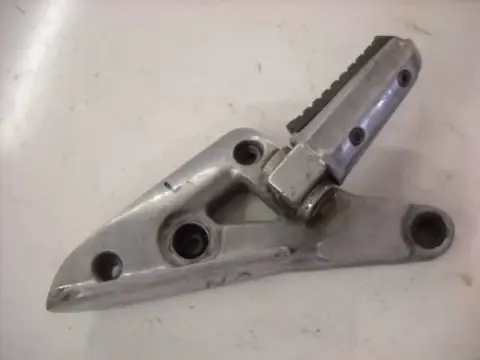 Kawasaki VN750A Voetsteun met bracket links achter 35011-1239