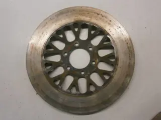 Suzuki GS550L Remschijf links voor