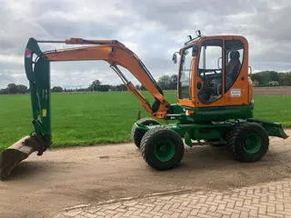 Neuson 6503 Graafmachine Bandenkraan (bj 2010)