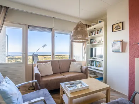 Gezellige studio met balkon en uitzicht over zee vlakbij De Koog