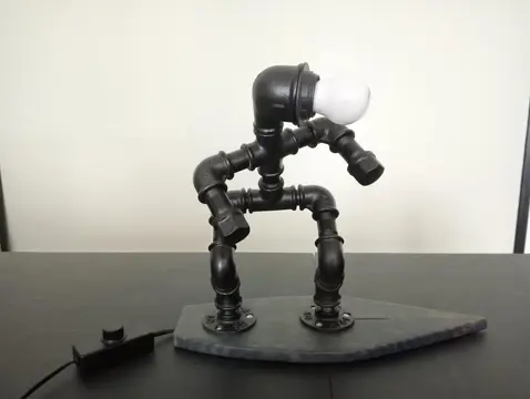 Industriële handgemaakte steampunk lamp motief surfer