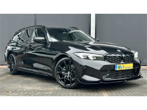 BMW 3-serie Competition M Touring 320e / Pano / ACC / M aerodynamica