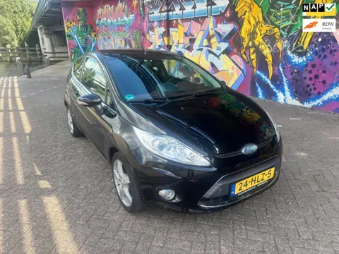 Ford Fiesta 1.25 Titanium airco navigatie mooie velgen elektrische ramen cv zeer leuke auto
